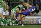 Brad Tighe gets thumped into the ground by Alan Tongue.