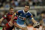 Gavin Cooper has an arm free and looks to offload.