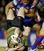 A South Sydney player is upended by Terence Seu Seu ...