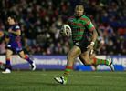 Roy Asotasi races away to score ...