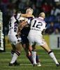Mitchell Sargent is tackled high ...