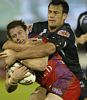 Kurt Gidley is collared by Logan Swann.