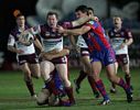 Glenn Hall can't push off Steve Simpson.