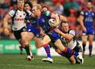 Luke Walsh puts the foot down to get close to the tryline.
