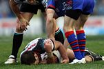 Mark O'Halloran lies on the ground ...