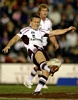 Matt Orford kicks with all his might.