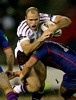 Steven Bell is going nowhere against the Knights brick wall defence.