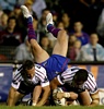 Kurt Gidley is turned upside down by Manly.