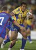 Danny Buderus prepares to pass, while Nathan Hindmarsh watches on.