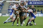 Sam Rapira is dragged down ...