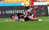 Thomas Ah Van crosses for one of his three tries, despite Marty Paulson's efforts.