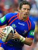 Kurt Gidley forces his way across early for a super solo try.