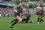 Wes Naiqama, having a blinder at fullback, is tackled.