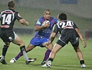 Richard Fa'aoso puts the moves on the Warriors defenders.