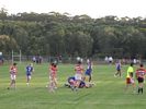 The Newcastle defensive line reforms after a tackle.